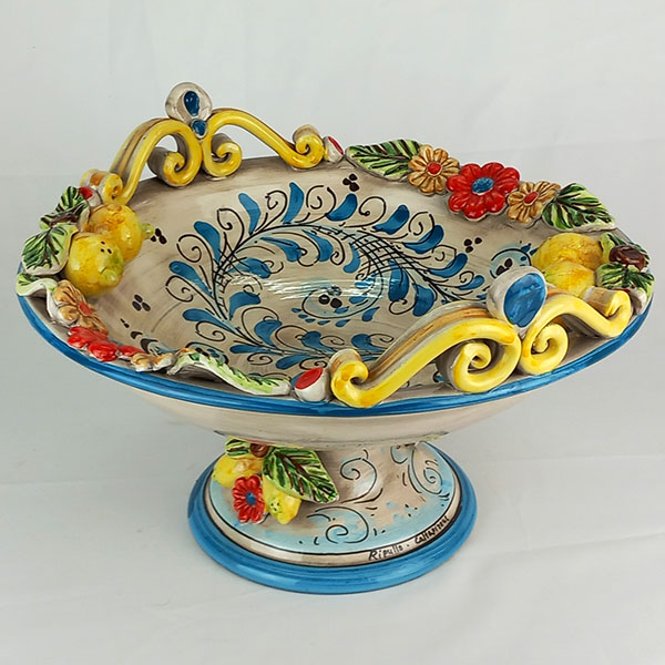 ceramic centerpiece with blue decoration