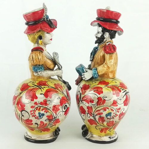 pair of ceramic lumiere figurines