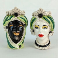 coppia di teste in ceramica decoro verde