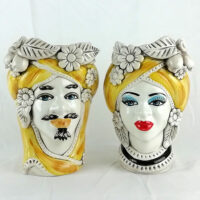 pair of caltagirone ceramic moor heads enriched with lemons