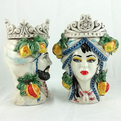 Pair of caltagirone ceramic fruit bearing heads, classic moor heads, for classic settings,