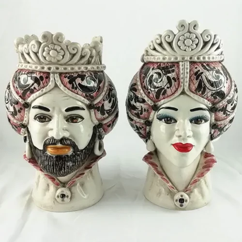 Moderna coppia di teste in ceramica decoro bordeaux