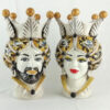 pair of dark brown heads modern orange ceramic decoration from caltagirone