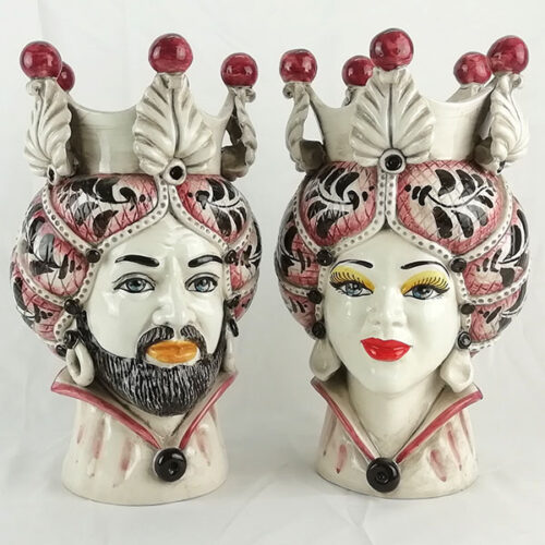 Pair of Norman Moor heads in caltagirone ceramic with bordeaux decoration