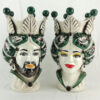 Coppia teste di moro normanno in ceramica di Caltagirone decorate in verde alte 33cm,