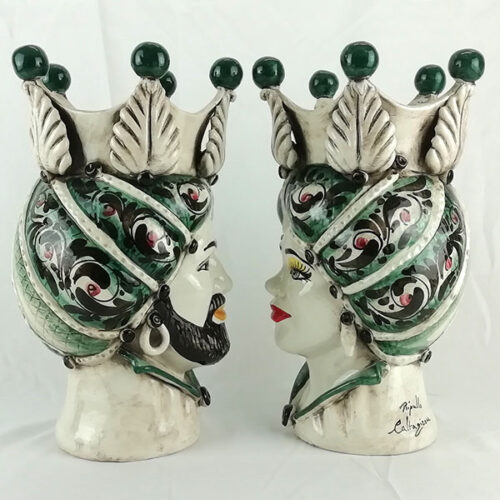 Teste di moro normanno in ceramica di Caltagirone decorate in verde alte 33cm,