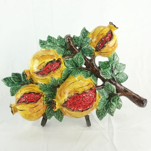 Frutta in ceramica da appendere come decorazione per la casa